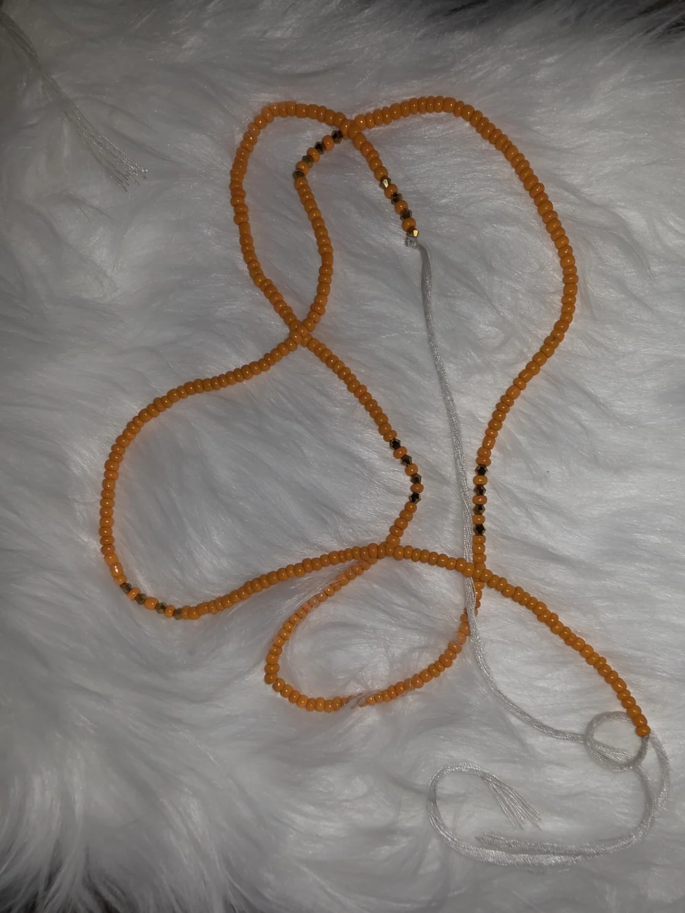 Handcrafted Orange Beaded Hair Wrap with Tassel Accent